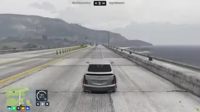 Luxury car driving on Great Ocean Highway in FiveM with QBCore driving scripts.