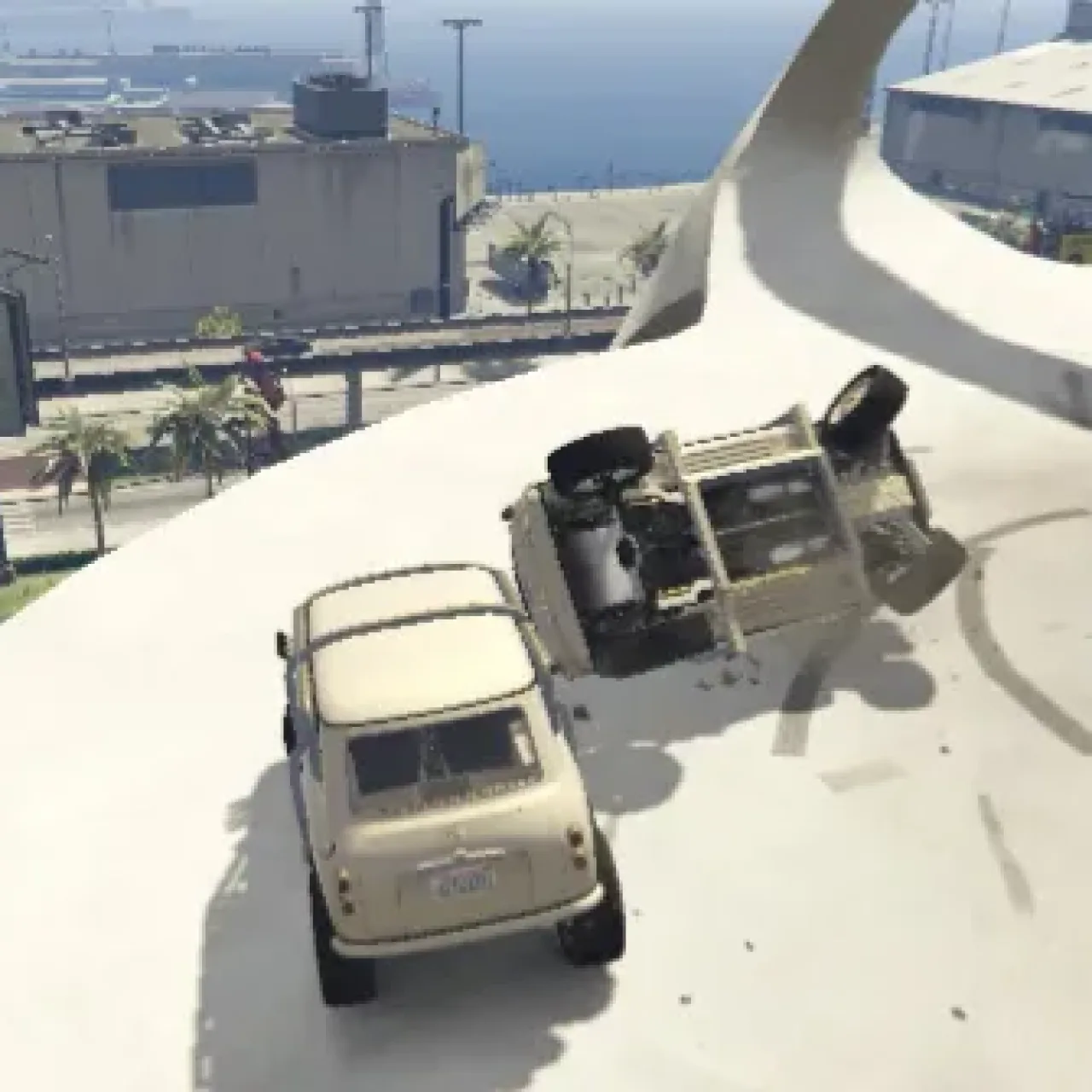 FiveM vehicle crash stunt on rooftop map with two cars