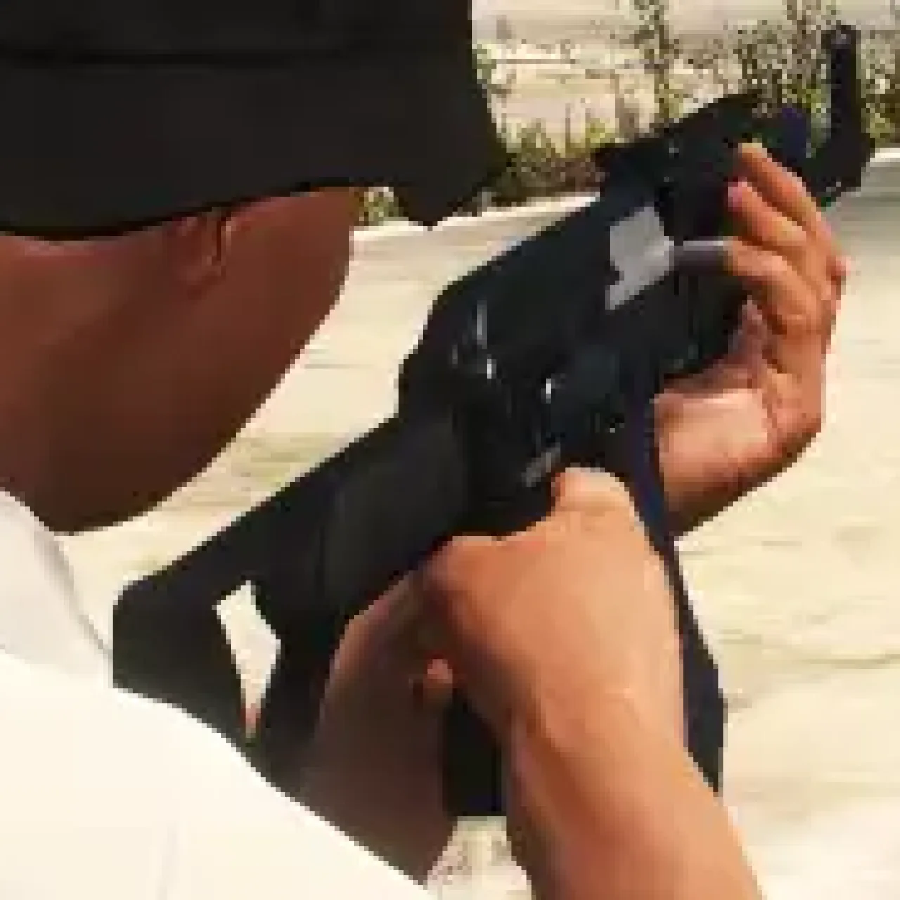 FiveM screenshot of a player manually reloading a rifle using the ESX Weapons Reload Script for realistic combat mechanics.